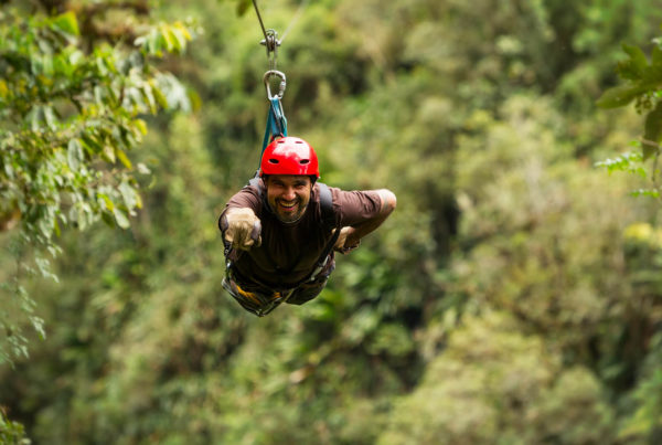 Man zip lining on his stomach